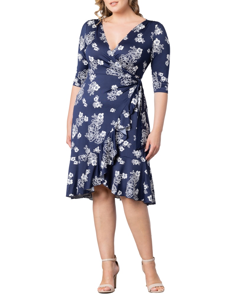 Front of a model wearing a size 5X Flirty Flounce Wrap Dress in HEAVENLY BLOOMS by Kiyonna. | dia_product_style_image_id:303098